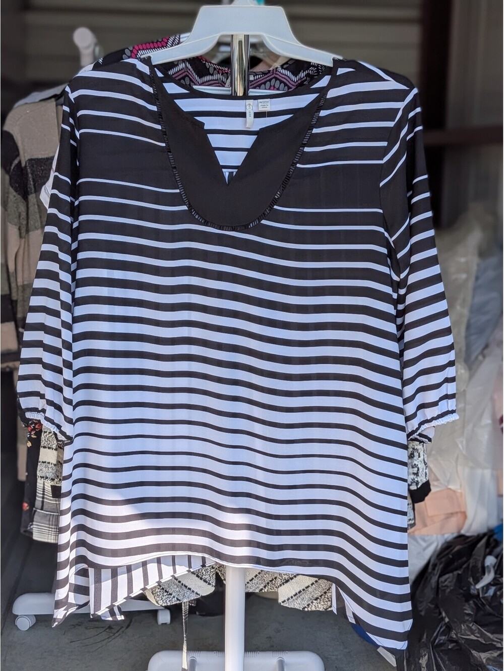 Black and white striped V-neck top